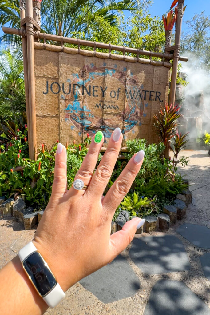 Hand showing Moana-inspired nails at EPCOT’s Journey of Water attraction
