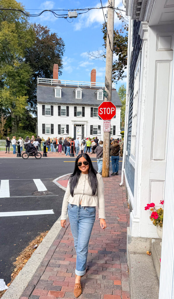 Lisa on Main Street, Canadian Disney blogger, poses in front of the Ropes Mansion which served as Allison's house in Hocus Pocus 